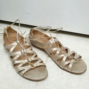 STUART WEITZMAN strappy gold leather sandals